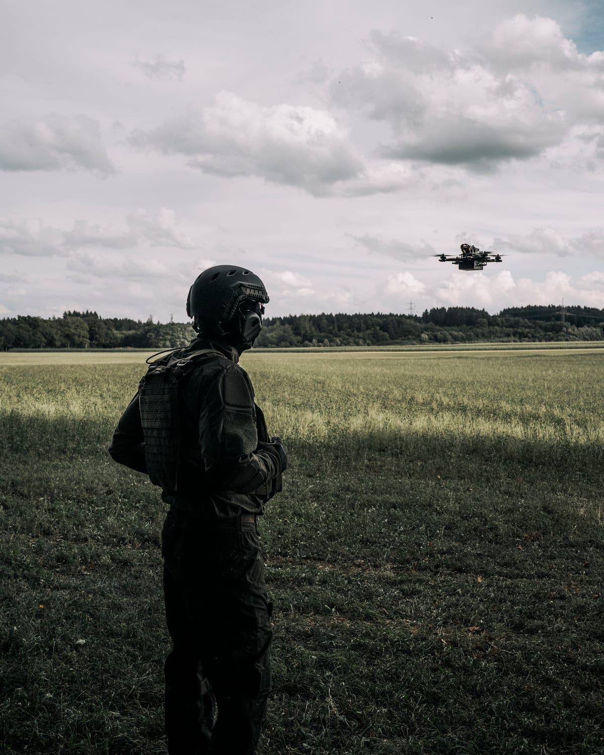 Operator watching the interceptor over open terrain